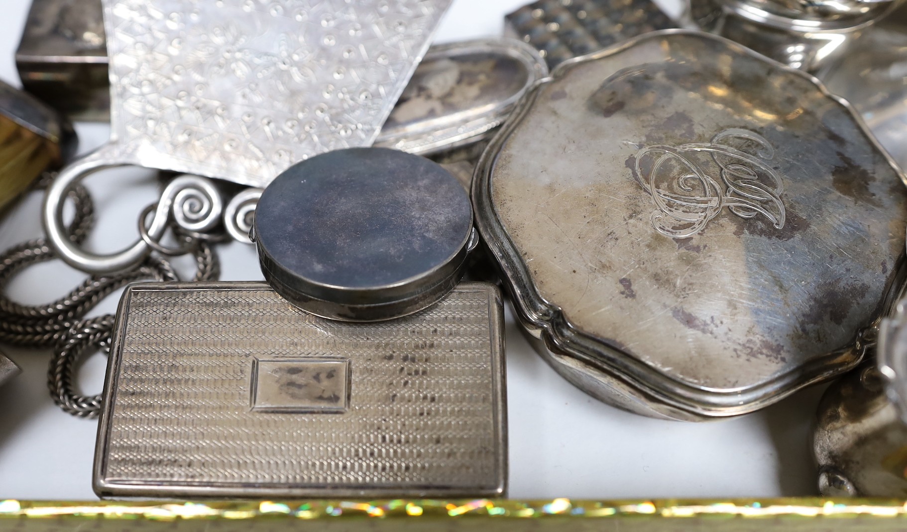 Assorted silver including a pierced bowl, pair of dwarf candlesticks, four condiments(a.f.), cigarette box, lid, 19th century snuff box and vinaigrette, match sleeve oval pill box, oval pepperette with handle and modern